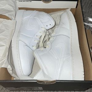 All white Air Jordan 1 mid
